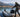 A man carrying his bag to board on his inflatable boat f