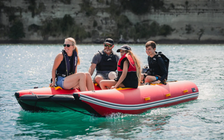 People using inflatable boat | Truekit.US