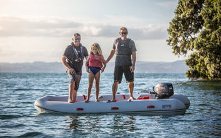family riding a True Kit inflatable boat