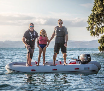 family riding a True Kit inflatable boat