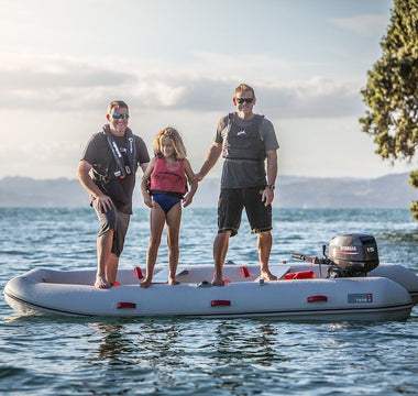 family riding a True Kit inflatable boat