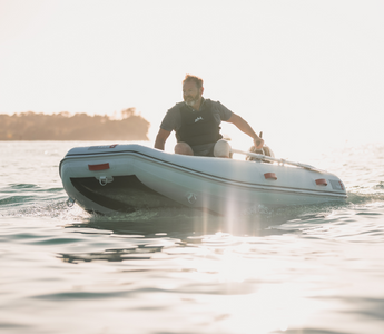 man riding a True Kit Navigator inflatable boat