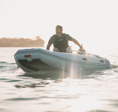 man riding a True Kit Navigator inflatable boat